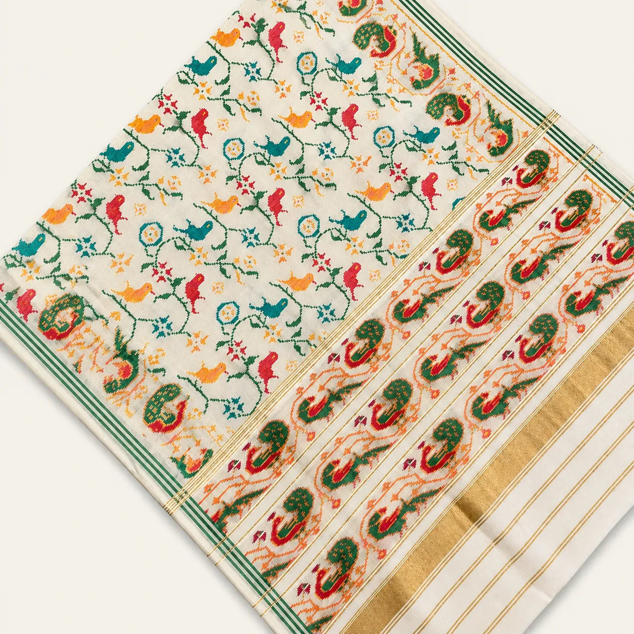 Ivory Peacock Garden Patola Saree