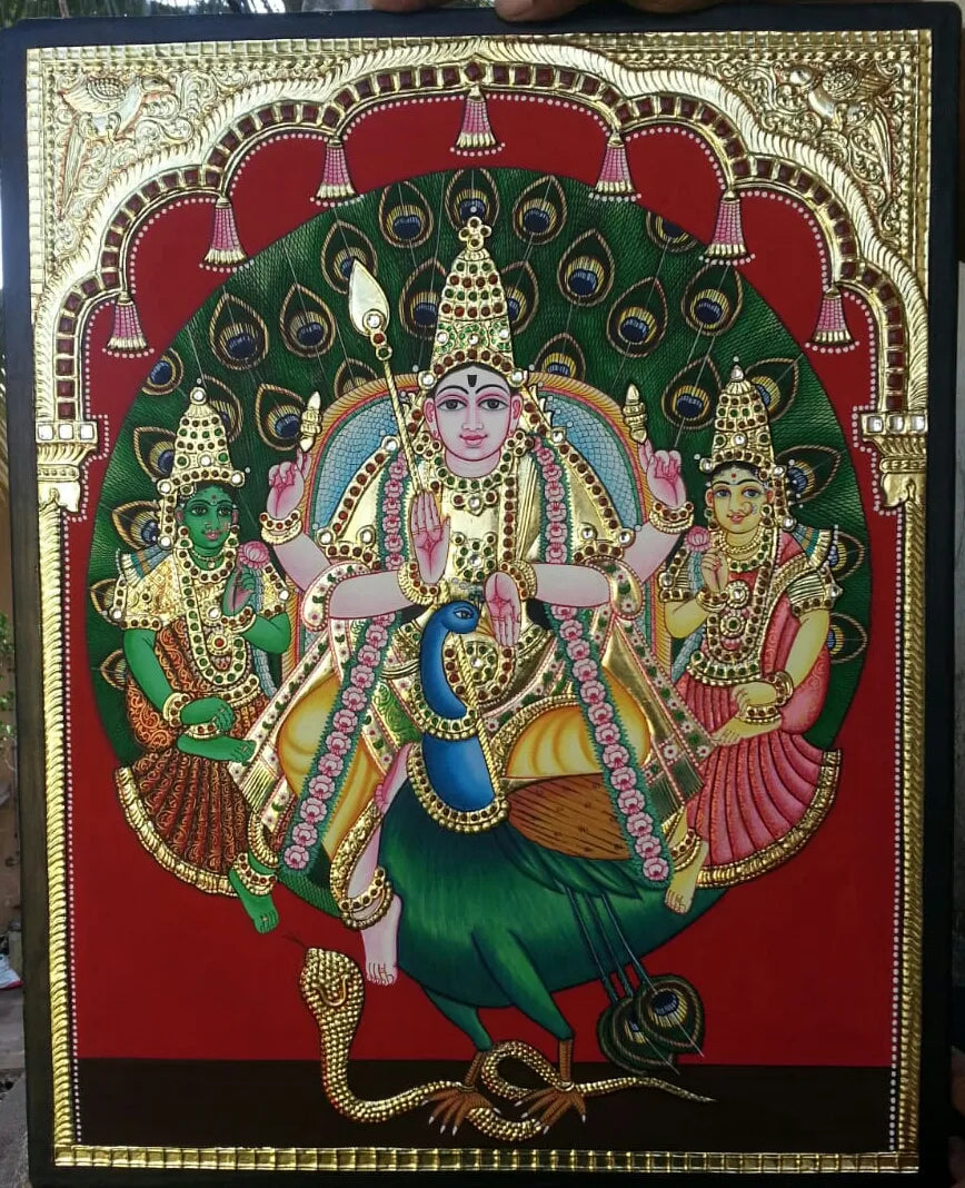 Colorful depiction of a deity with attendants on a red background, framed in gold red background with peacock Lord Subramanya (Murugan/Kartikeya) tanjore painting 